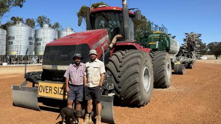 Neville (left) and Jim Hamilton, with Ginger the Kelpie, are taking a slow and steady approach to canola and lupin sowing this week.
